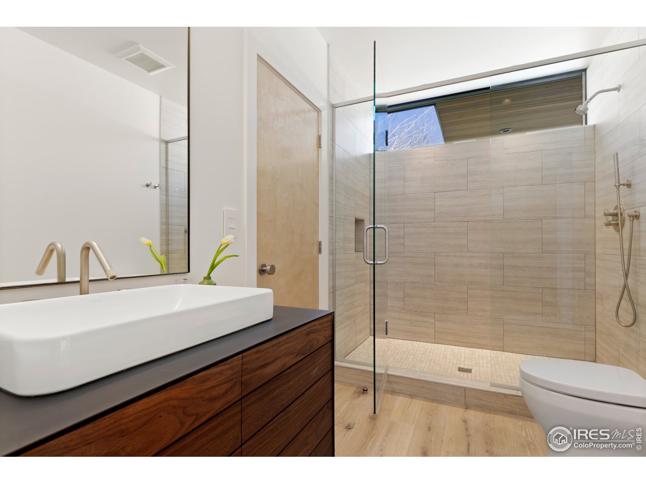 550 Iris Avenue Boulder, CO 80304 - Photo 26 of 39 a bathroom with a sink and a mirror