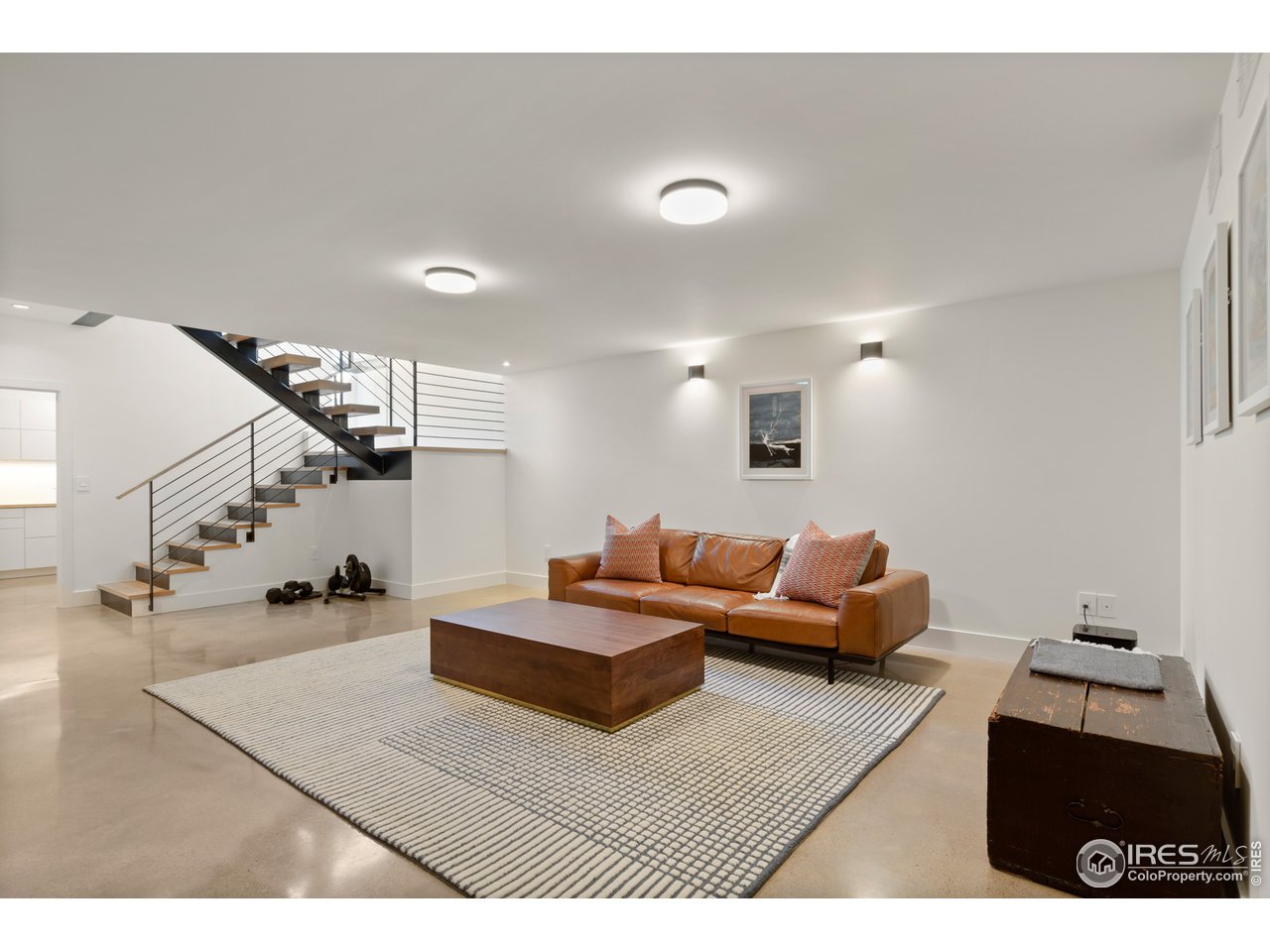550 Iris Avenue Boulder, CO 80304 - Photo 27 of 39 a living room with furniture and wooden floor