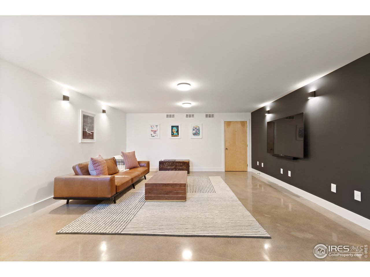 550 Iris Avenue Boulder, CO 80304 - Photo 28 of 39 a living room with furniture and a flat screen tv
