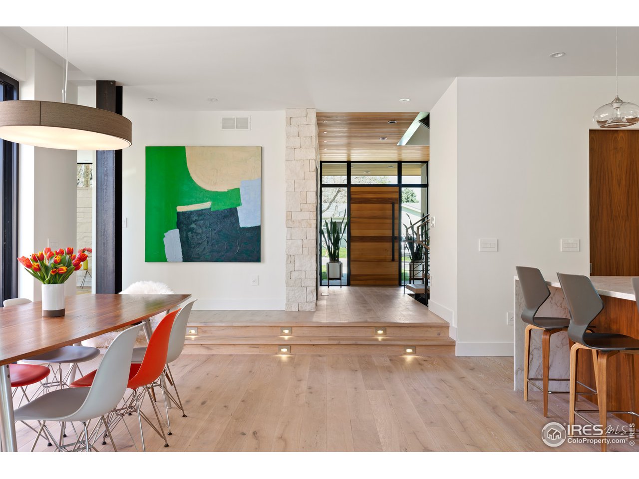 550 Iris Avenue Boulder, CO 80304 - Photo 9 of 39 a view of dining room with furniture and a large window