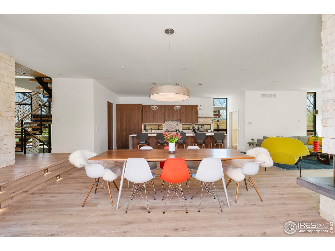 550 Iris Avenue Boulder, CO 80304 - Photo 10 of 39 a dining room with furniture and wooden floor