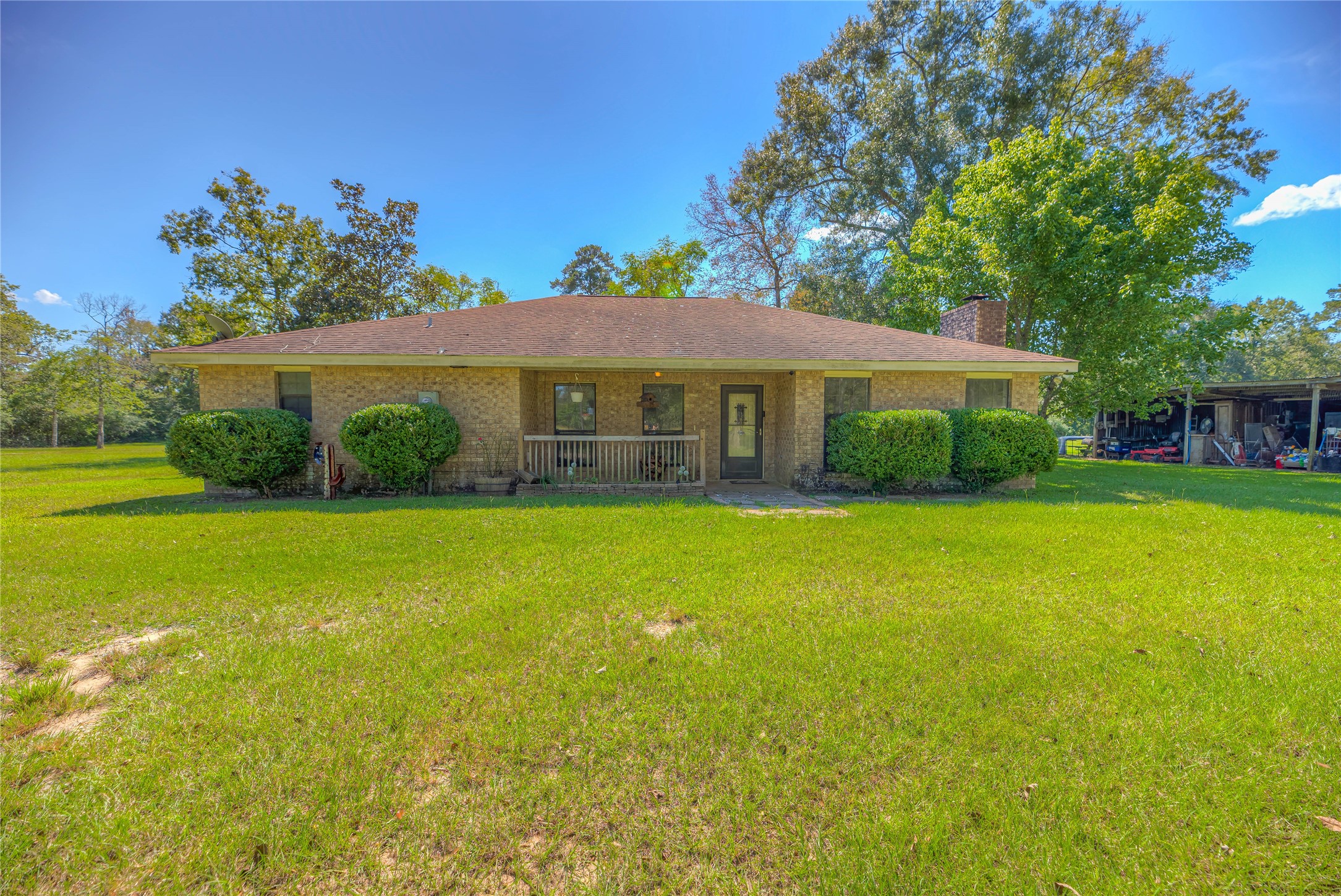 438 Bird Road Livingston, TX 77351 - Photo 17 of 37 a front view of house with yard and outdoor seating