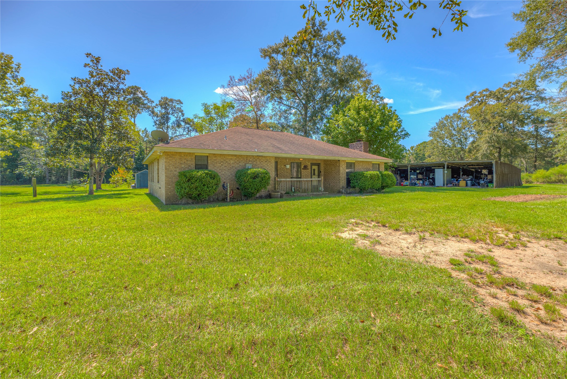 438 Bird Road Livingston, TX 77351 - Photo 19 of 37 a view of a house with a big yard