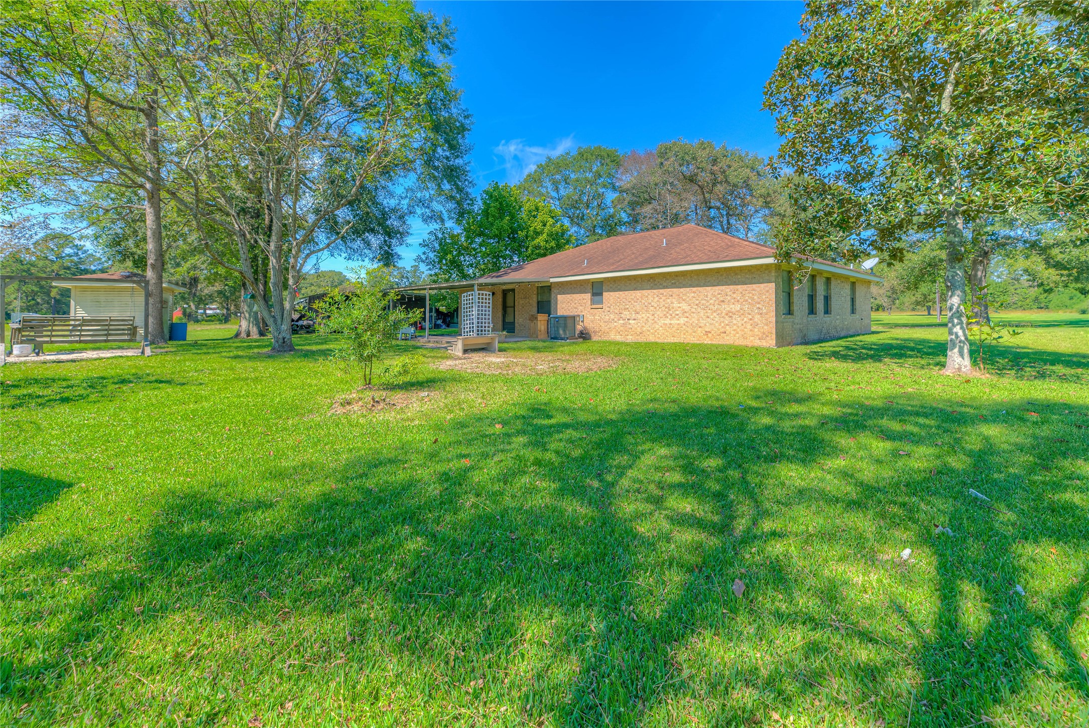 438 Bird Road Livingston, TX 77351 - Photo 20 of 37 front view of a house with a yard