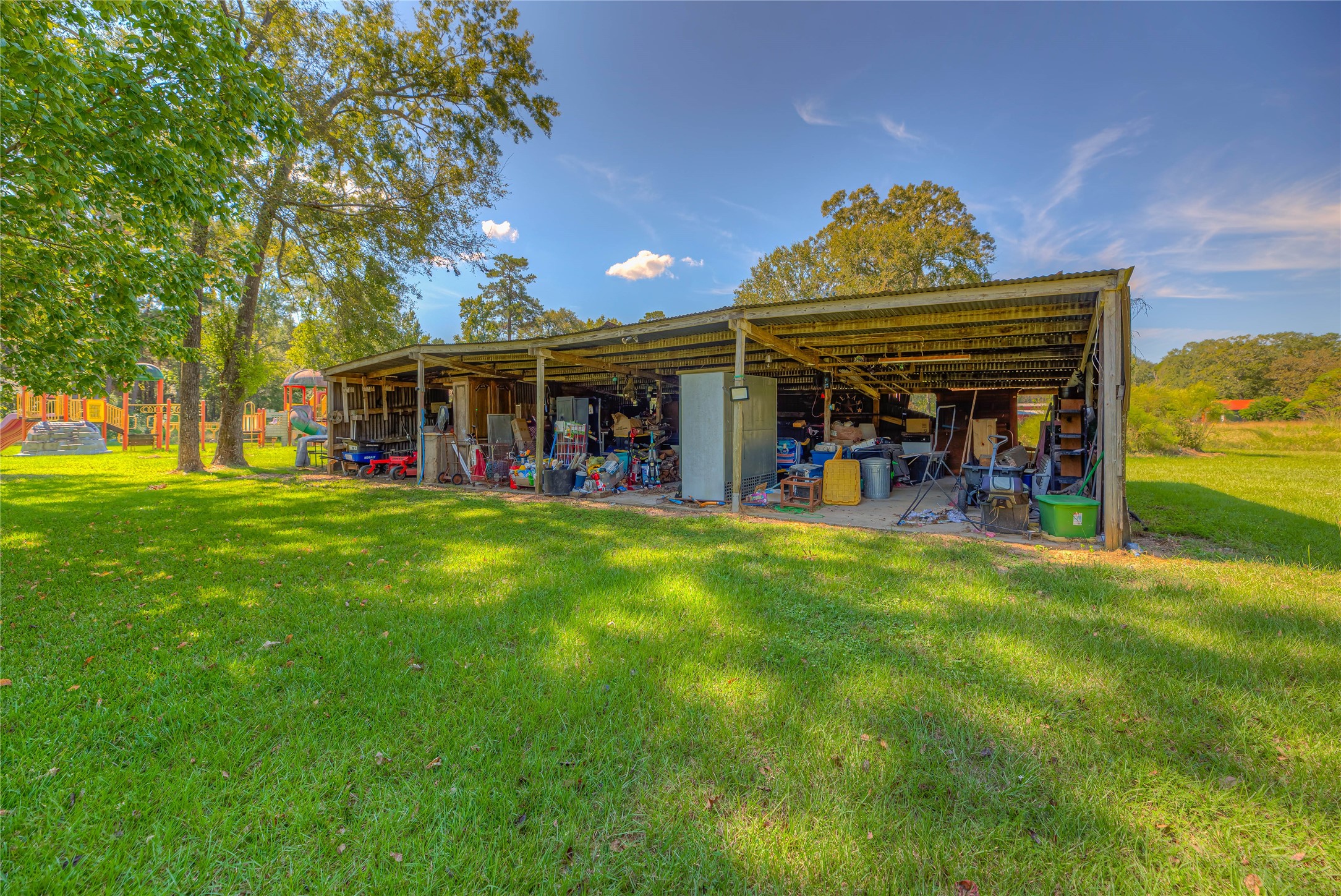 438 Bird Road Livingston, TX 77351 - Photo 22 of 37 a view of a chairs and table in front of house