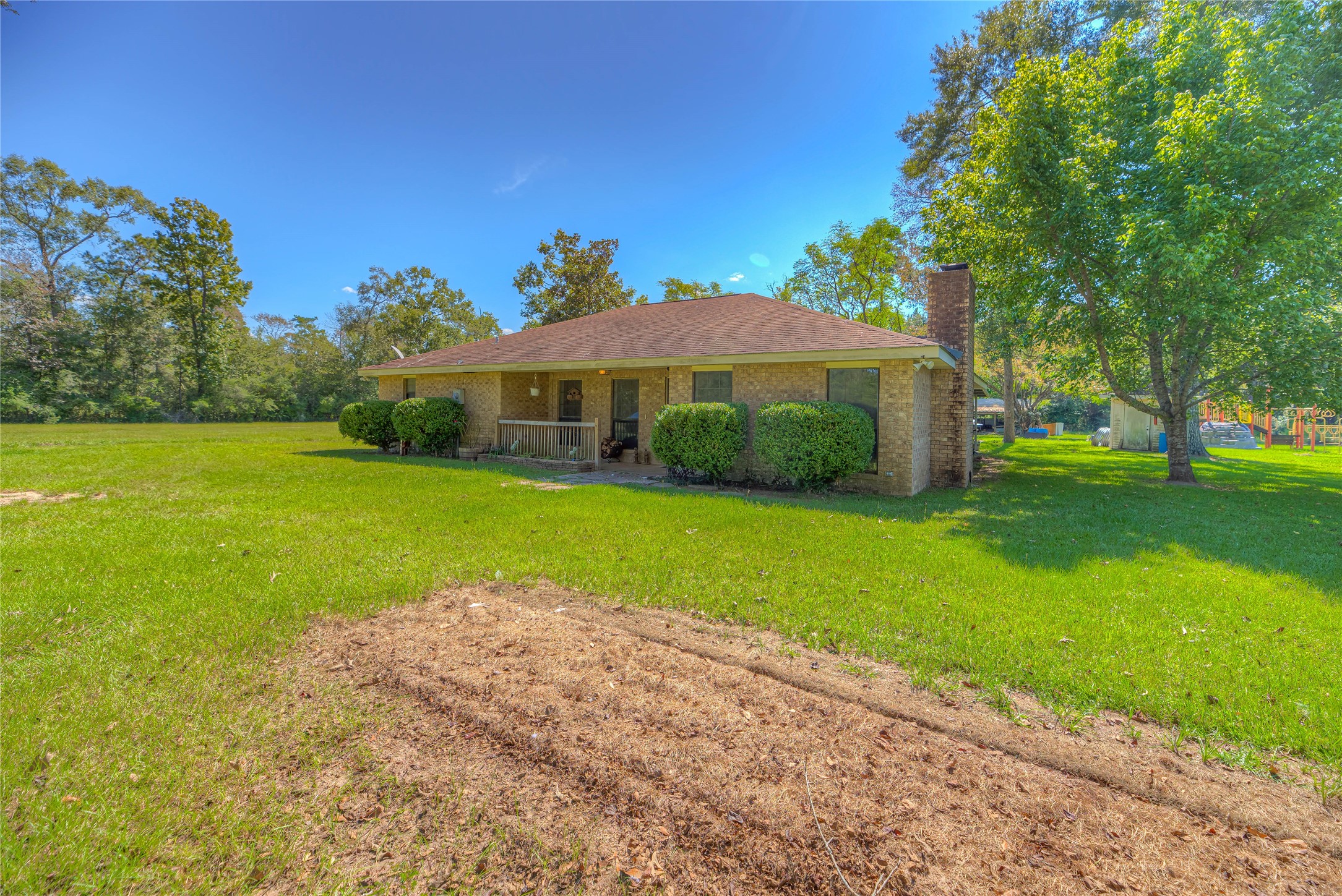 438 Bird Road Livingston, TX 77351 - Photo 23 of 37 a view of a house with a big yard