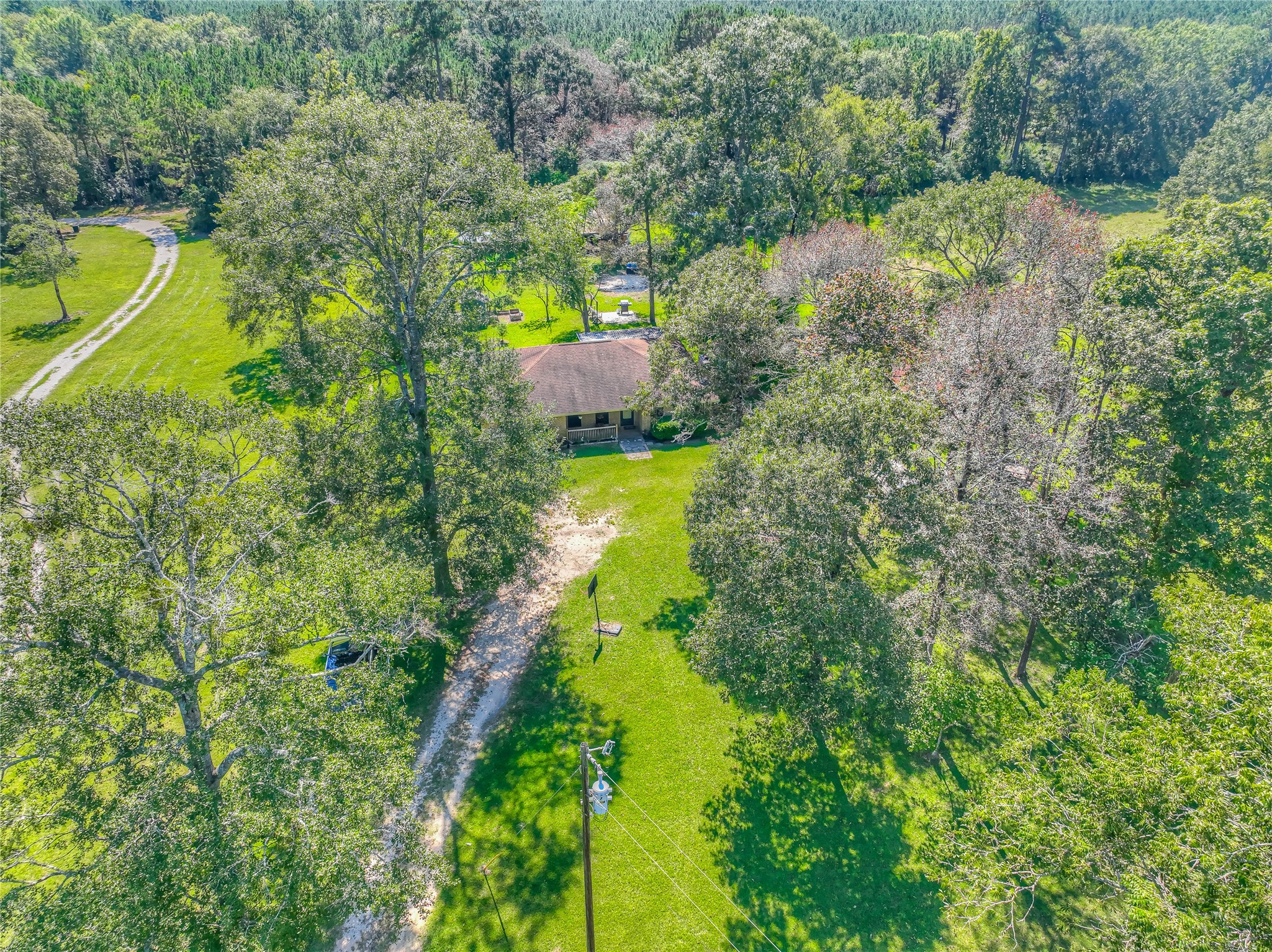 438 Bird Road Livingston, TX 77351 - Photo 36 of 37 an aerial view of a residential houses with yard