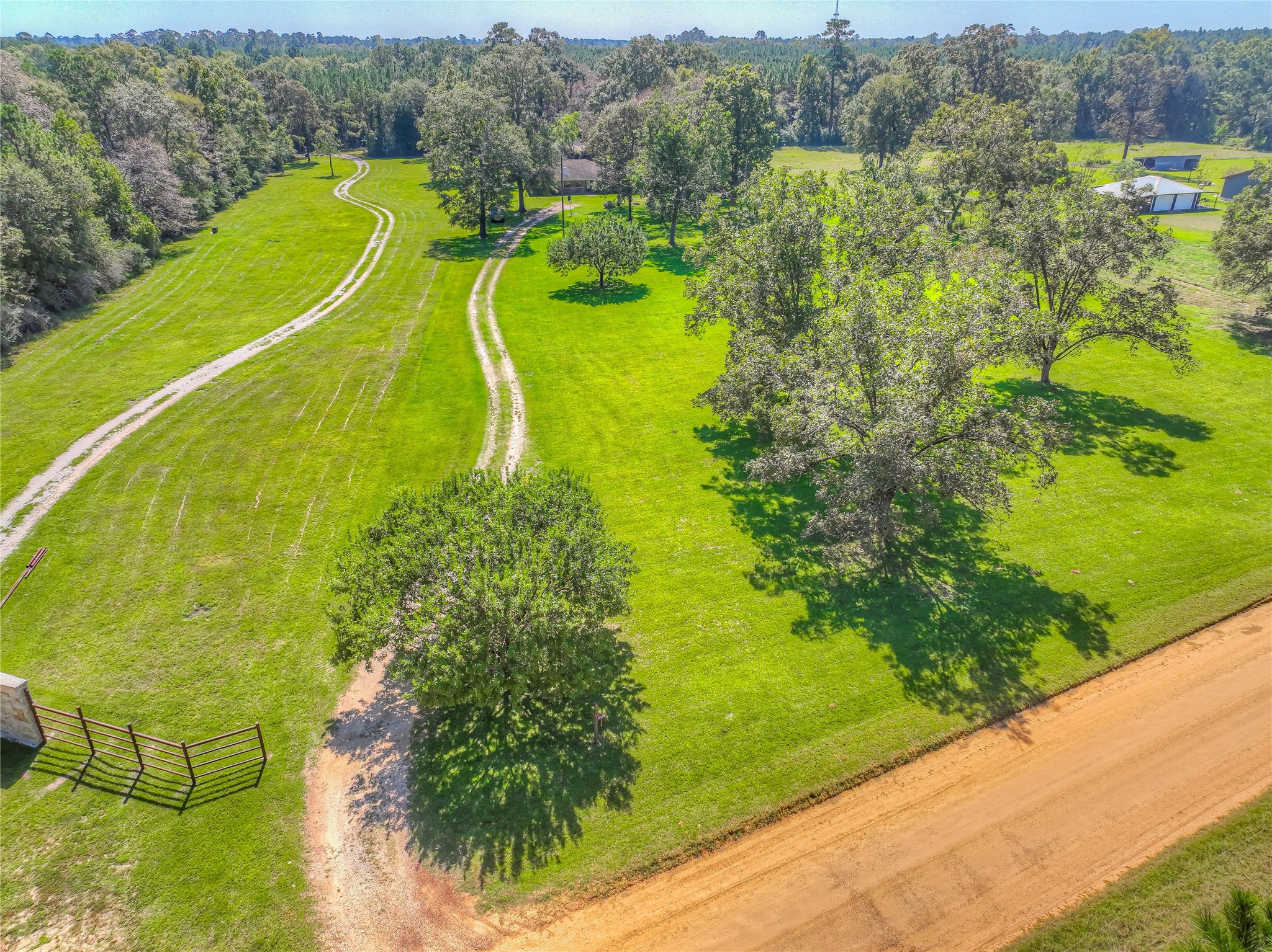 438 Bird Road Livingston, TX 77351 - Photo 37 of 37 a view of a swimming pool with a garden and mountain view
