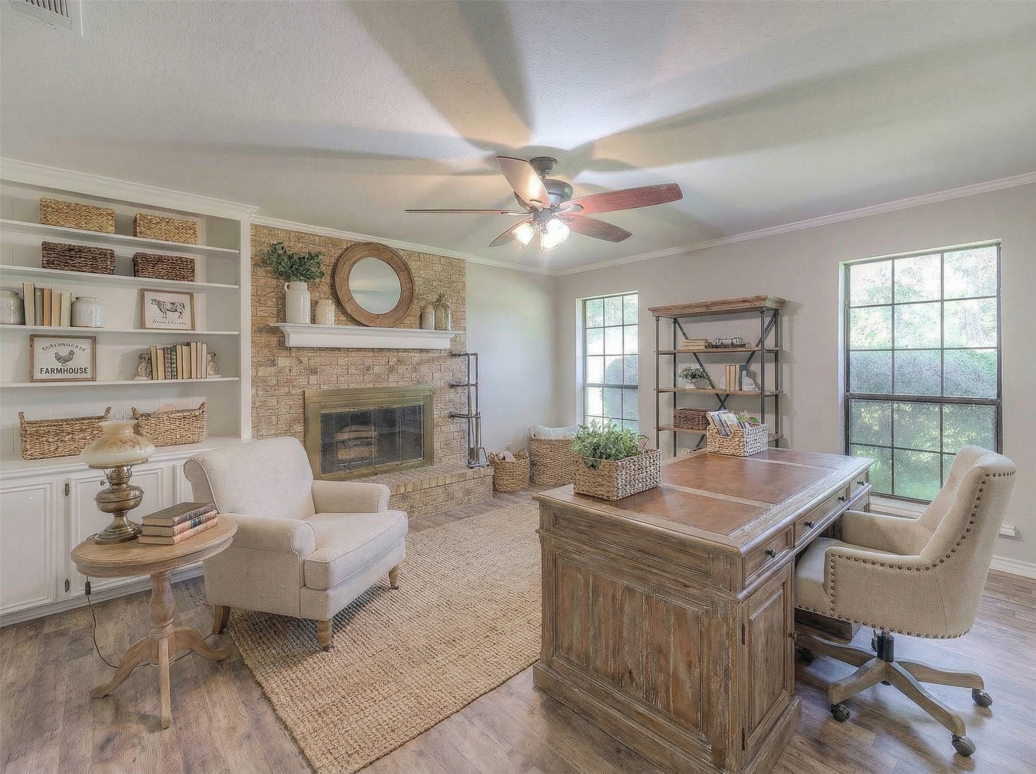 438 Bird Road Livingston, TX 77351 - Photo 6 of 37 a dining room with furniture a fireplace and wooden floor