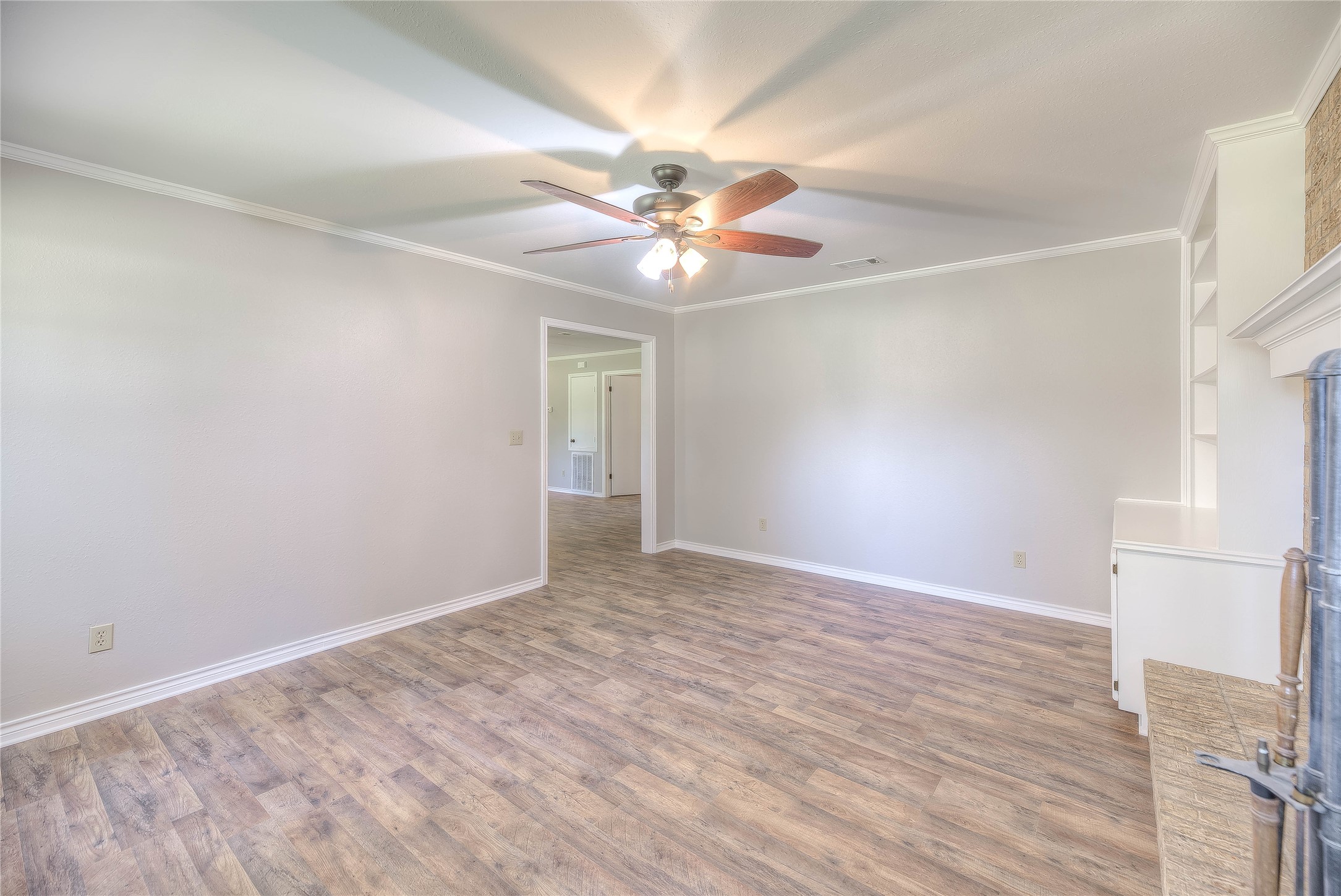 438 Bird Road Livingston, TX 77351 - Photo 8 of 37 wooden floor in an empty room
