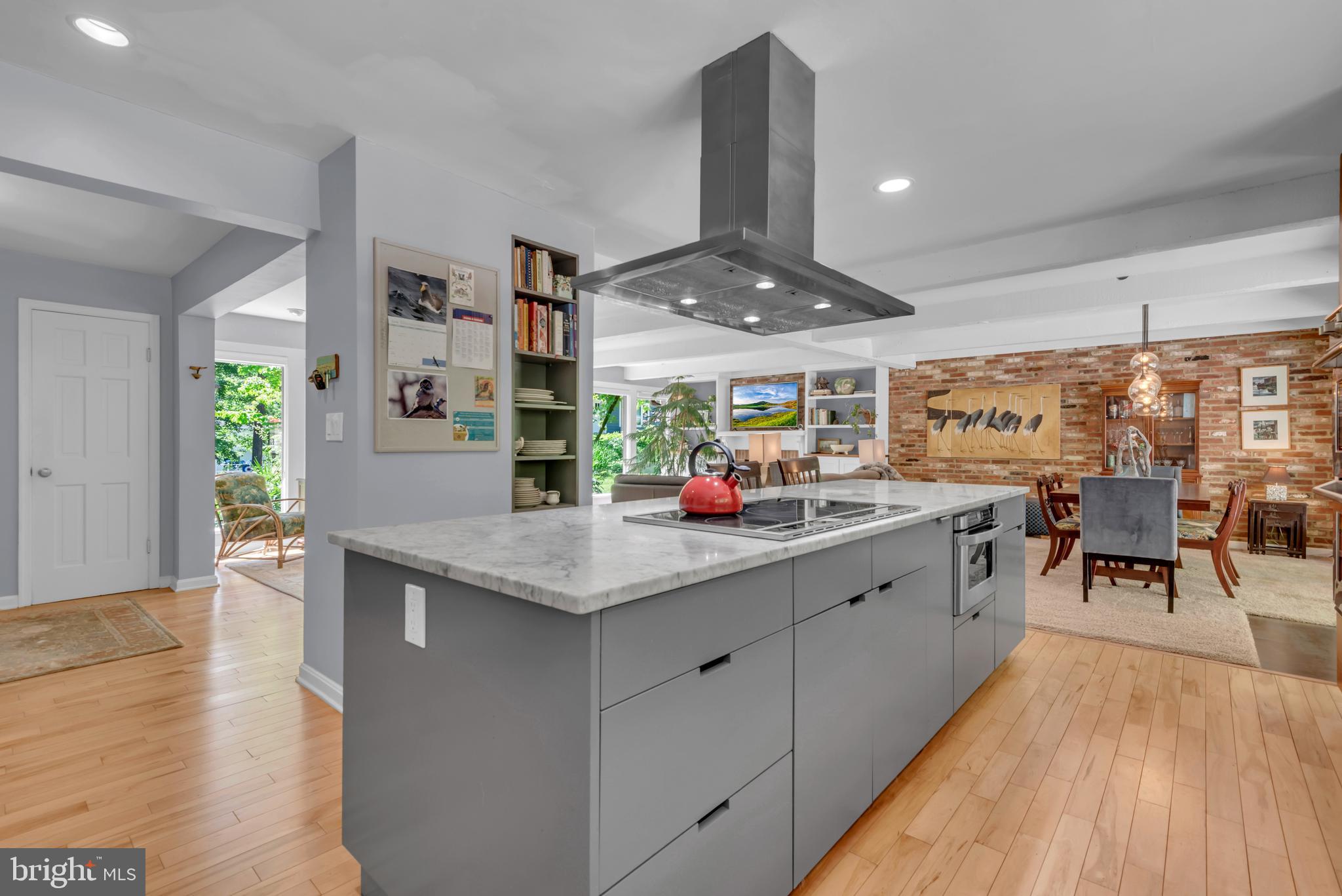 1870 Poplar Road Annapolis, MD 21401 - Photo 13 of 51 Electric cooktop with island range hood.