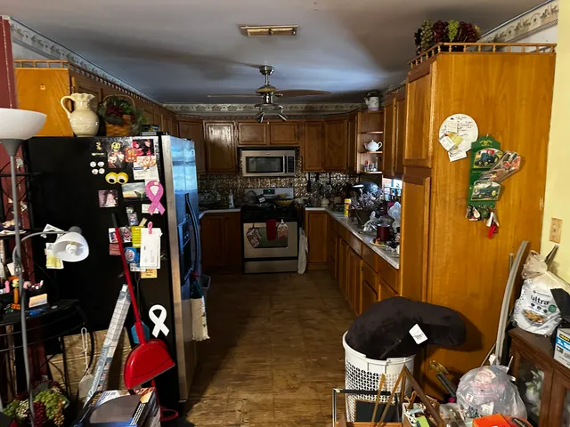 a living room filled with furniture and a chandelier