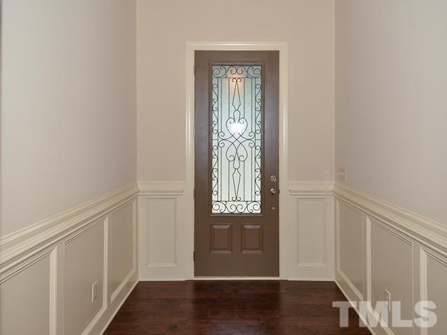 75 Whistling Straight Road, Unit 69 Pinehurst, NC 28374 - Photo 2 of 20 An 8 ft. glass front door with iron details greets you at the entry.