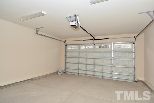 75 Whistling Straight Road, Unit 69 Pinehurst, NC 28374 - Photo 17 of 20 The large 2-car Garage offers plenty of space for parking and storage.