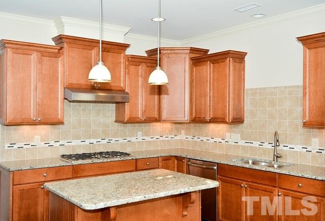 75 Whistling Straight Road, Unit 69 Pinehurst, NC 28374 - Photo 5 of 20 Offering a center island, granite countertops, and maple cabinetry, the Kitchen is both well-planned and beautiful!