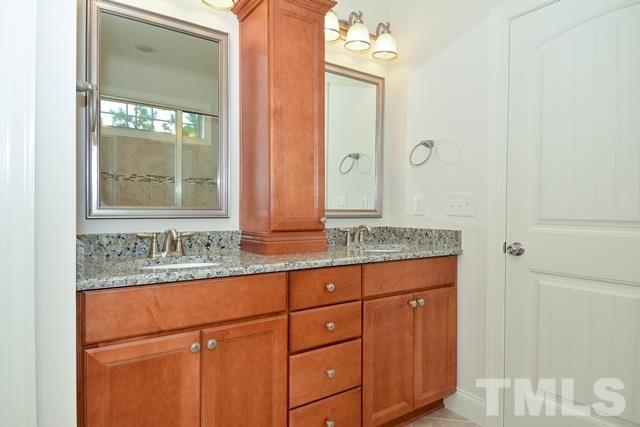 75 Whistling Straight Road, Unit 69 Pinehurst, NC 28374 - Photo 8 of 20 The Master Bath incorporates a double vanity with a tower cabinet providing plenty of space and storage.