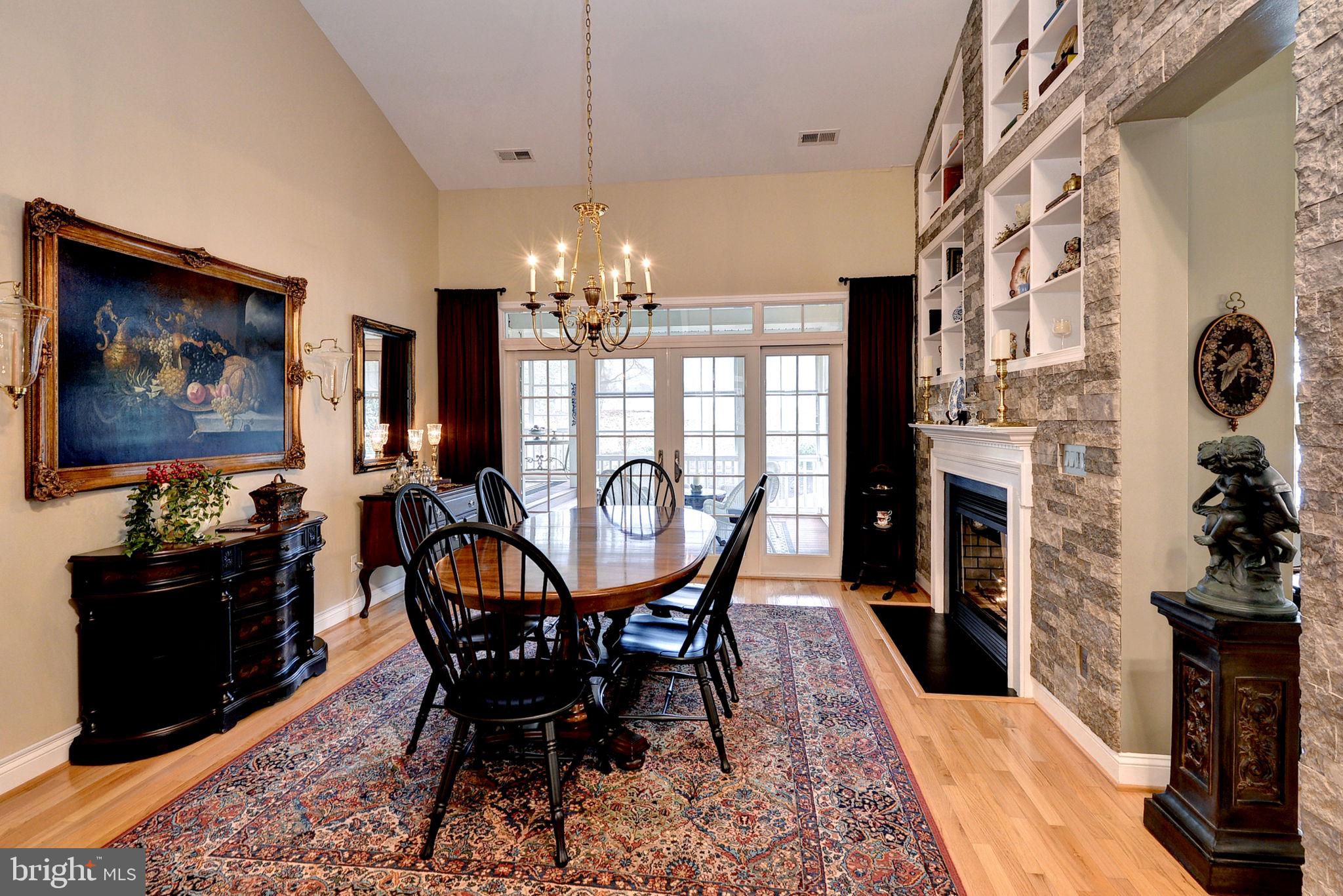 7100 Pinebrook Road Williamsburg, VA 23188 - Photo 14 of 86 a view of a dining room with furniture window and wooden floor