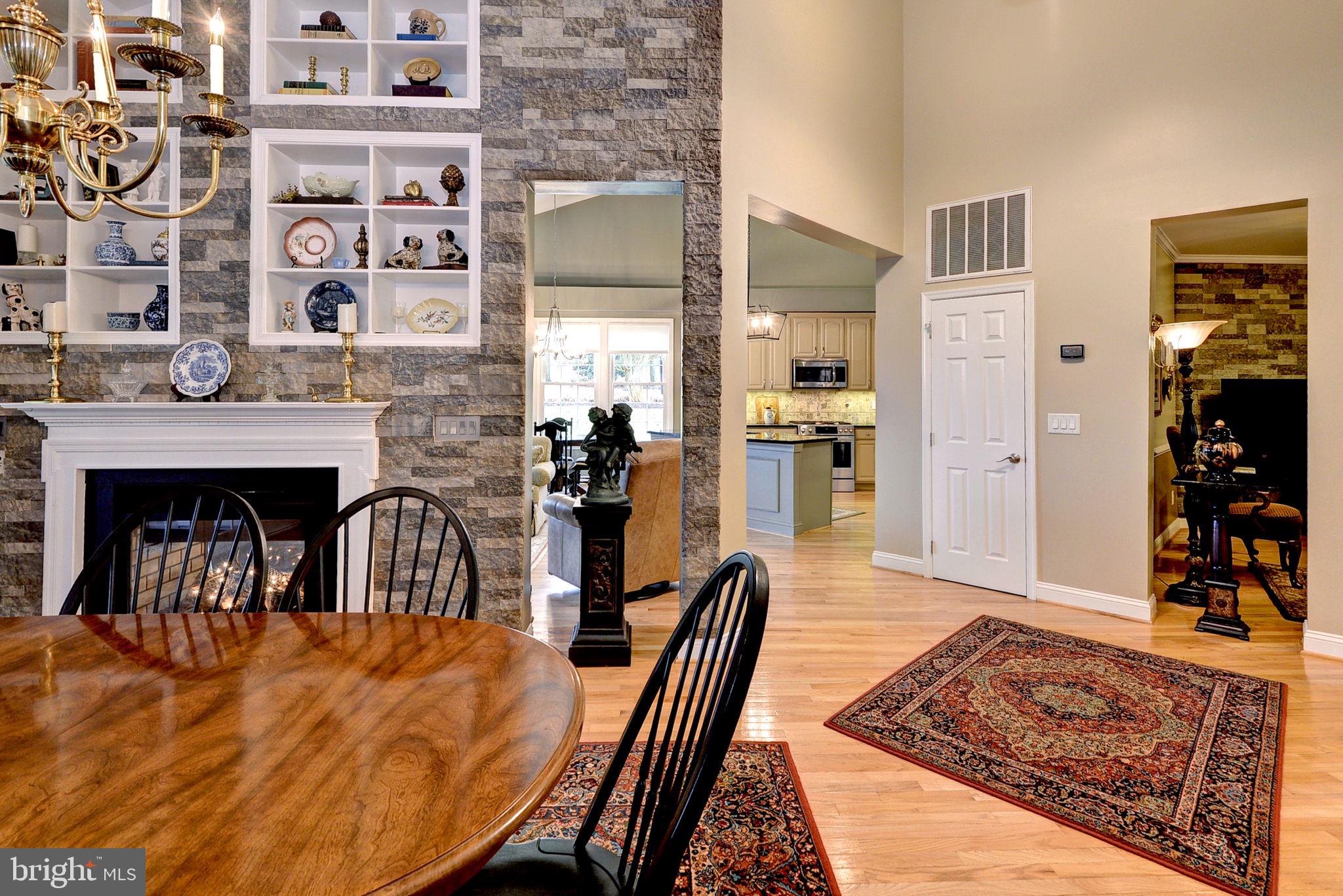 7100 Pinebrook Road Williamsburg, VA 23188 - Photo 16 of 86 a dining room with furniture and wooden floor