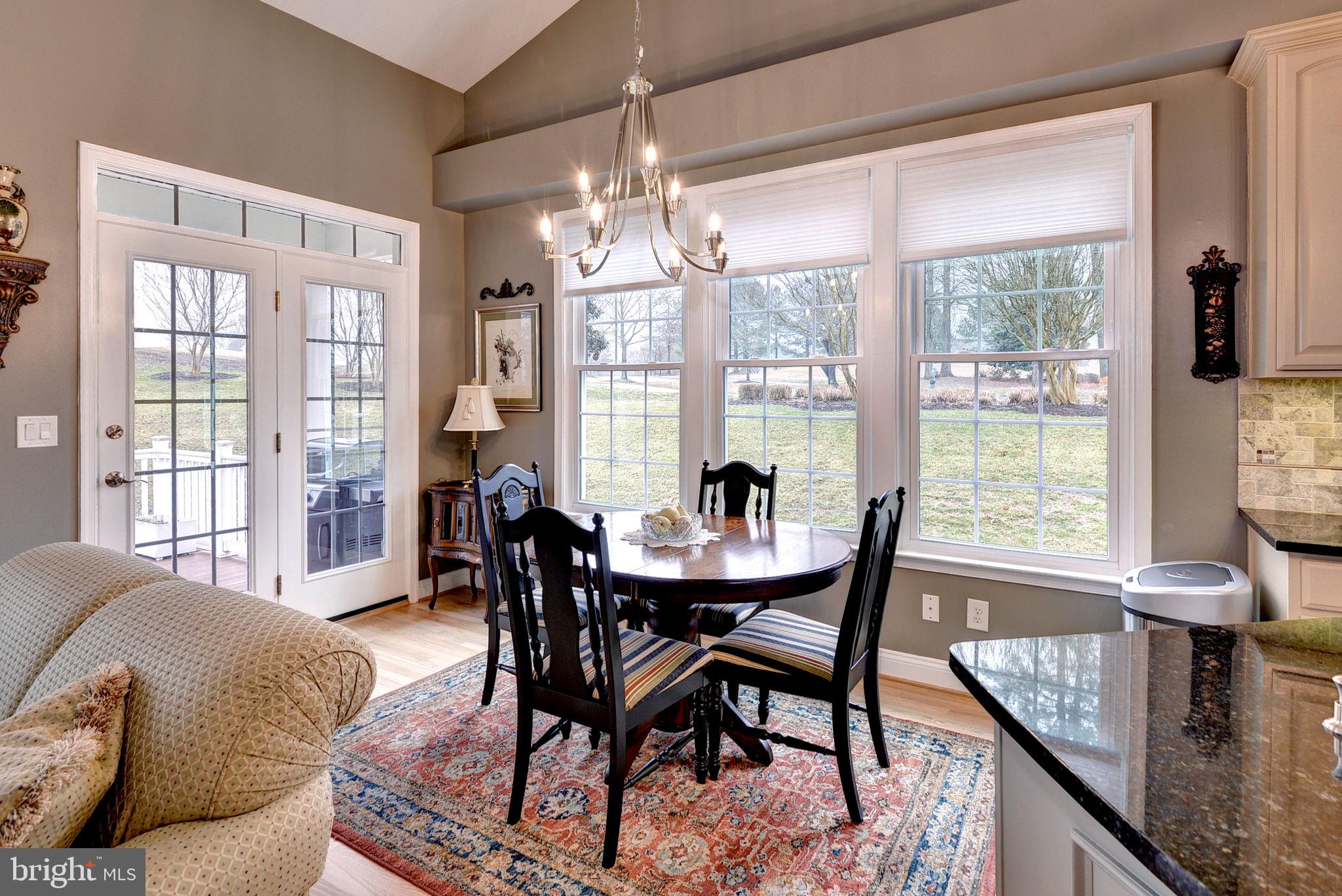 7100 Pinebrook Road Williamsburg, VA 23188 - Photo 21 of 86 a view of a dining room with furniture window and outside view