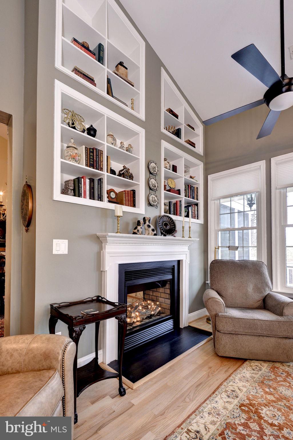 7100 Pinebrook Road Williamsburg, VA 23188 - Photo 23 of 86 a living room with furniture and a fireplace