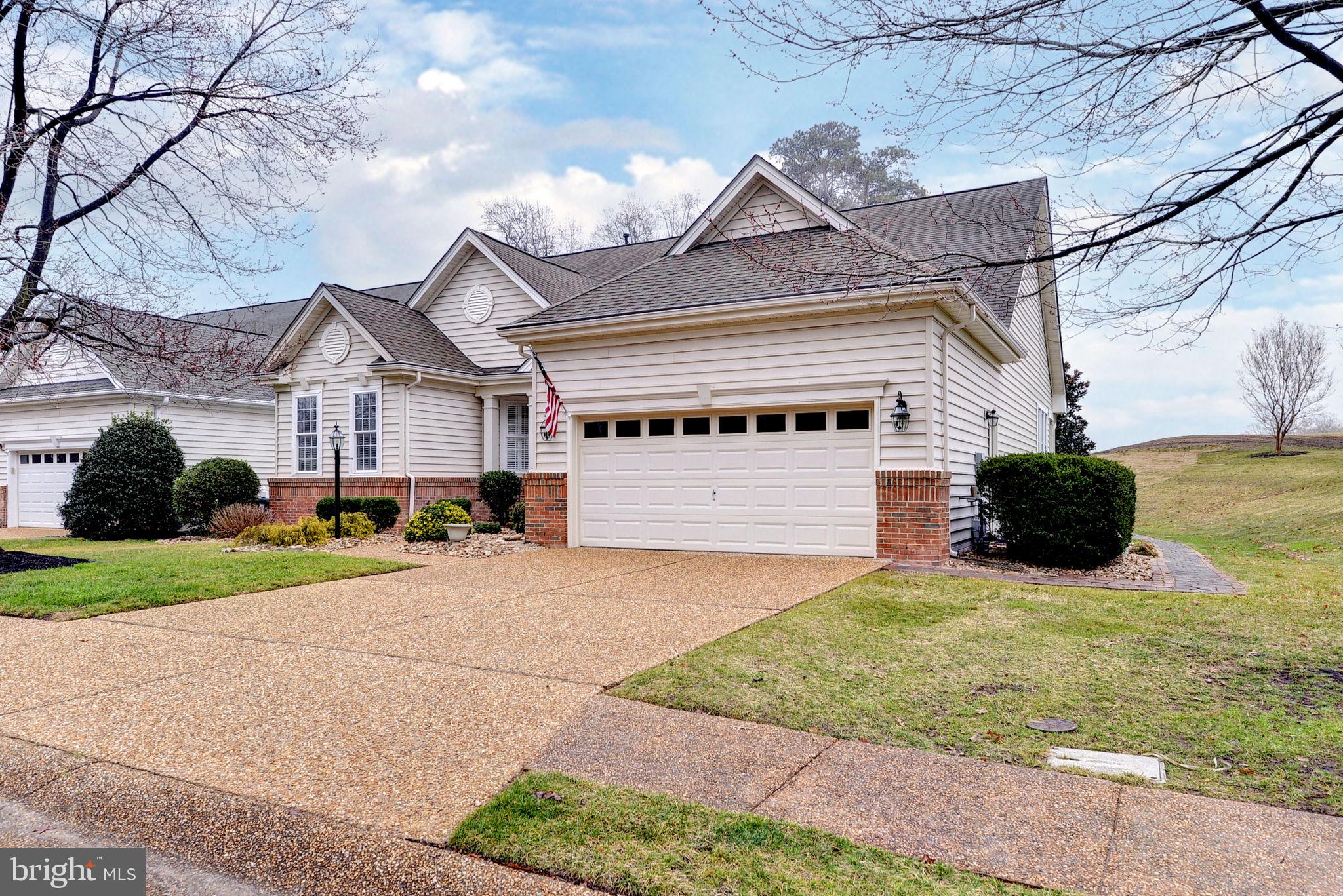 7100 Pinebrook Road Williamsburg, VA 23188 - Photo 5 of 86 a front view of a house with garden