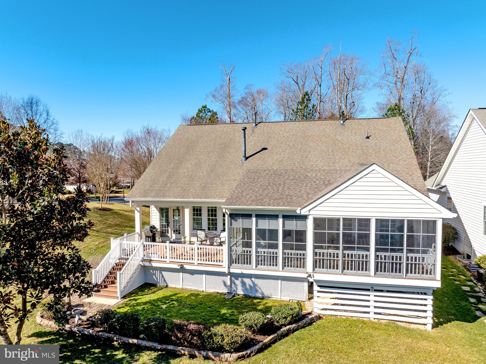 7100 Pinebrook Road Williamsburg, VA 23188 - Photo 68 of 86 a front view of a house with a garden and plants