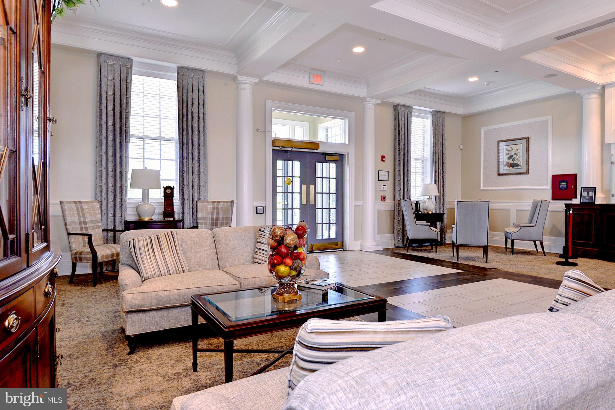7100 Pinebrook Road Williamsburg, VA 23188 - Photo 75 of 86 a living room with furniture and wooden floor