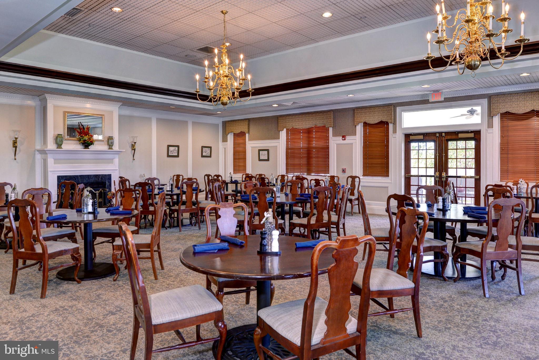 7100 Pinebrook Road Williamsburg, VA 23188 - Photo 79 of 86 a view of a dining room with furniture and chandelier