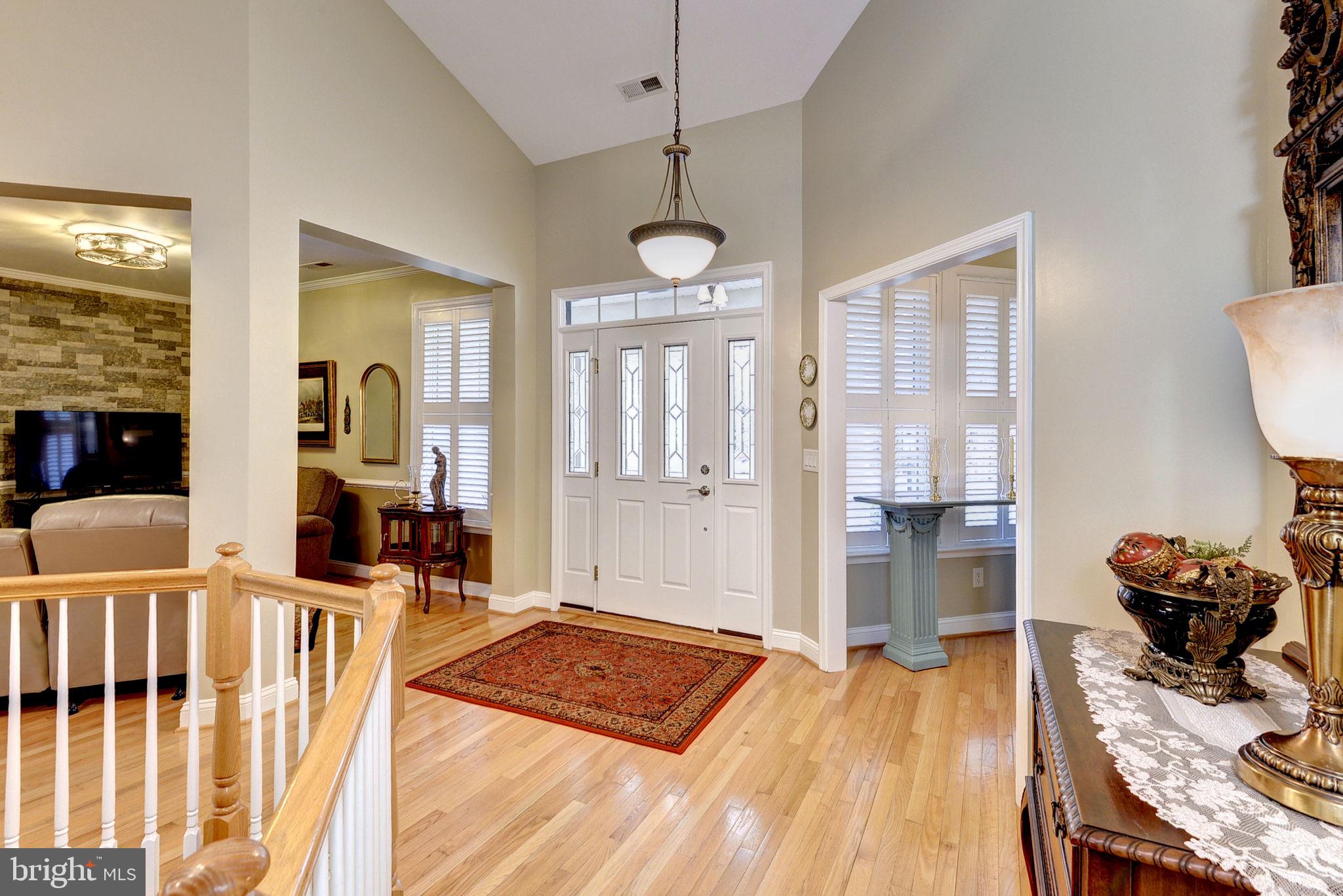 7100 Pinebrook Road Williamsburg, VA 23188 - Photo 9 of 86 a living room with furniture and wooden floor