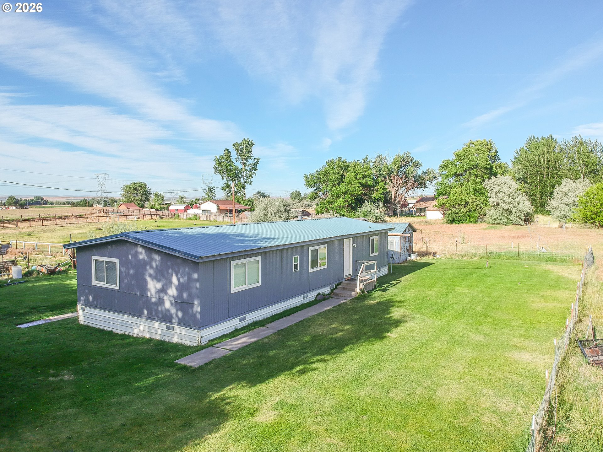 80649 Crooked Road Irrigon, OR 97844 - Photo 2 of 21 a view of a house with a yard