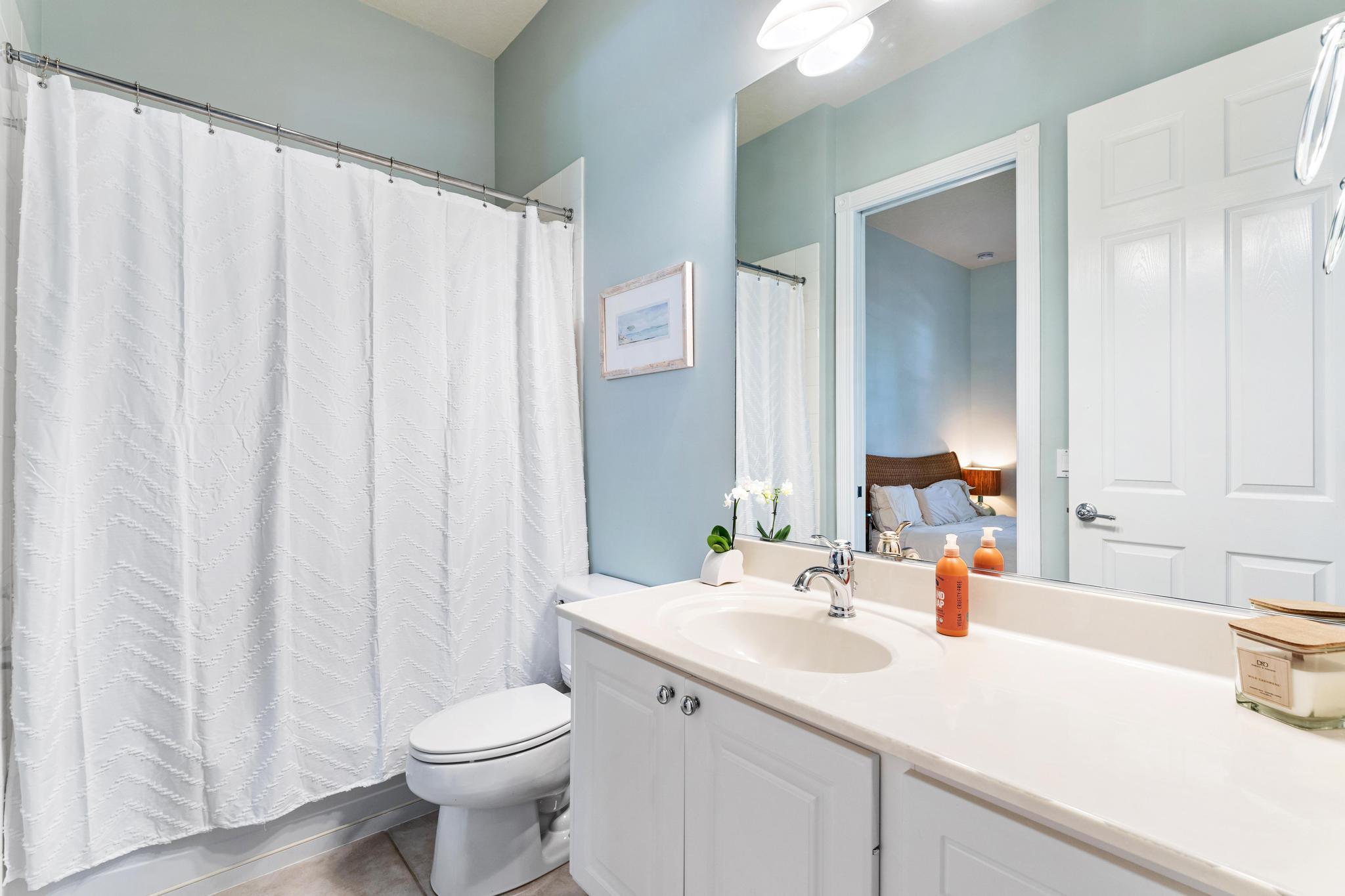 3446 West Mallory Boulevard Jupiter, FL 33458 - Photo 32 of 56 a bathroom with a sink and a toilet