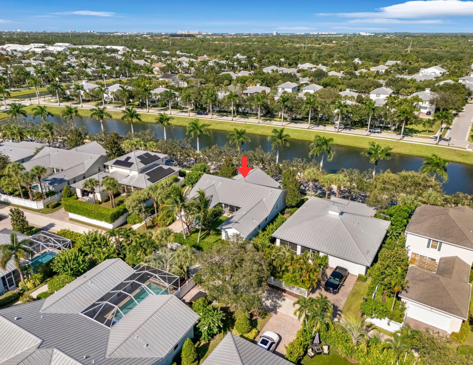 3446 West Mallory Boulevard Jupiter, FL 33458 - Photo 47 of 56 an aerial view of residential houses with outdoor space