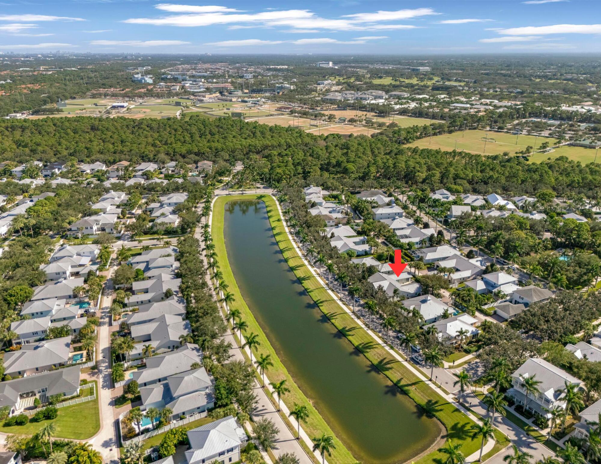 3446 West Mallory Boulevard Jupiter, FL 33458 - Photo 52 of 56 an aerial view of a city