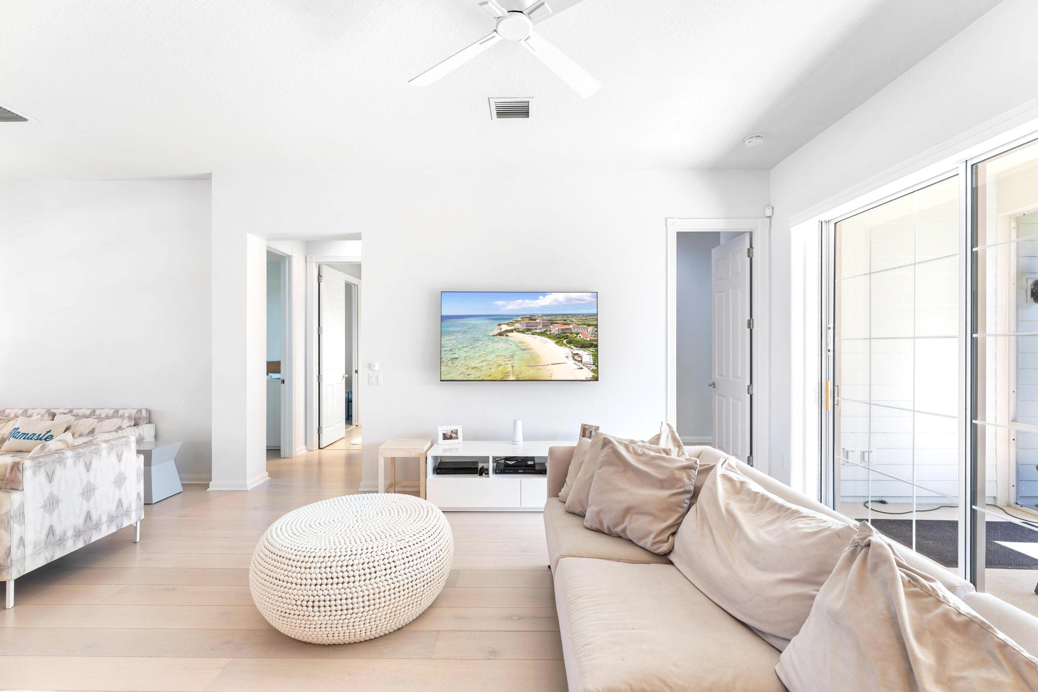3446 West Mallory Boulevard Jupiter, FL 33458 - Photo 10 of 56 a living room with furniture and a large window