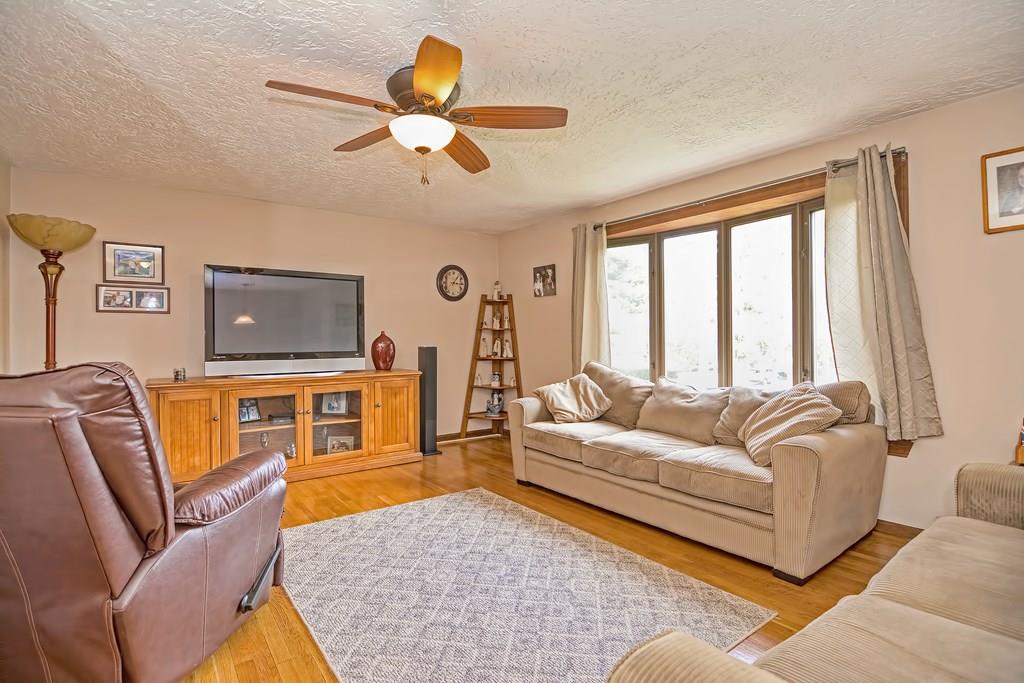 45 Frank Road Stoughton, MA 02072 - Photo 18 of 41 a living room with furniture and a large window