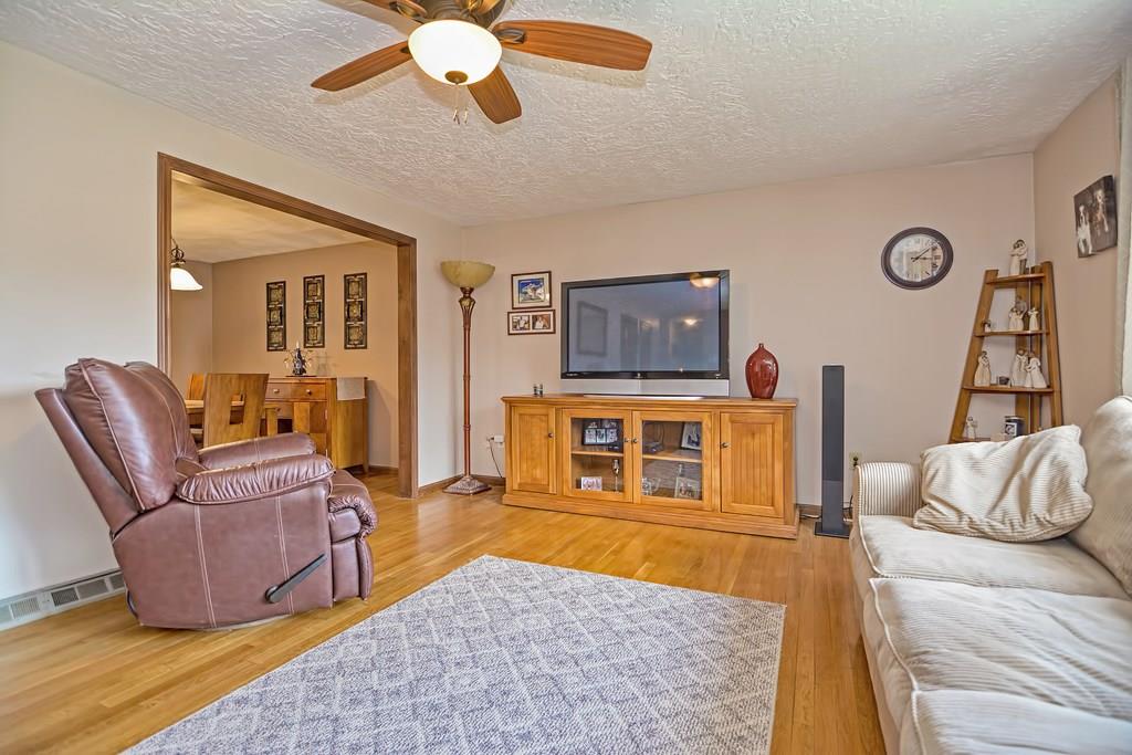 45 Frank Road Stoughton, MA 02072 - Photo 23 of 41 a living room with furniture and a flat screen tv