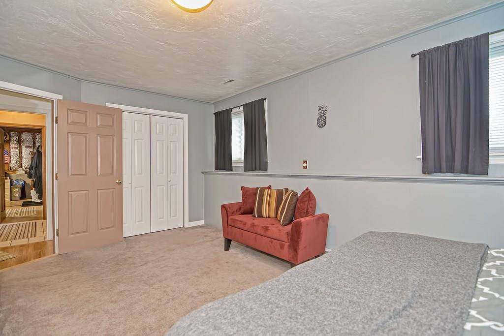 45 Frank Road Stoughton, MA 02072 - Photo 26 of 41 a living room with furniture