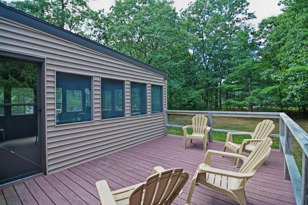 45 Frank Road Stoughton, MA 02072 - Photo 36 of 41 a view of house with deck and outdoor seating