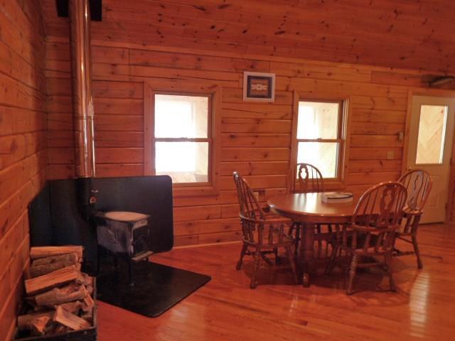139 Silsby Road Ellsworth, ME 04605 - Photo 12 of 27 Dining area with wood stove