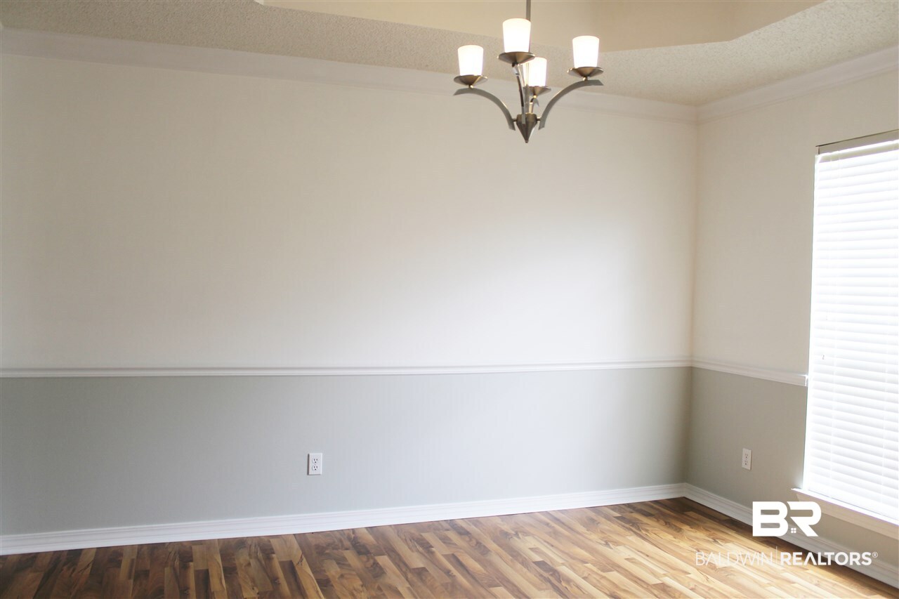 8522 Southern Oak Court Mobile, AL 36695 - Photo 7 of 21 Neutral colors and new chandelier