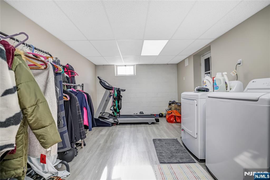 12 Maple Avenue, Unit A Waldwick, NJ 07463 - Photo 17 of 22 a view of walk in closet with clothes