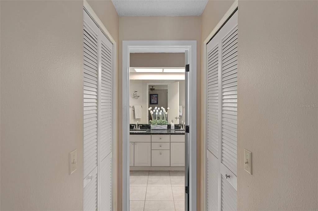 6421 Pine Meadows Drive Spring Hill, FL 34606 - Photo 31 of 61 a view of a bathroom from a hallway