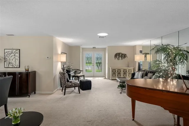 a living room with furniture and a couch