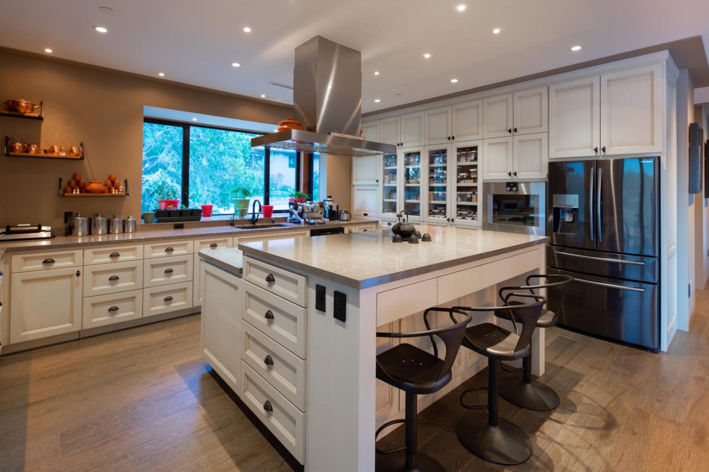 32 Potrero Trail Carmel, CA 93923 - Photo 8 of 14 a kitchen with stainless steel appliances granite countertop a stove and a refrigerator