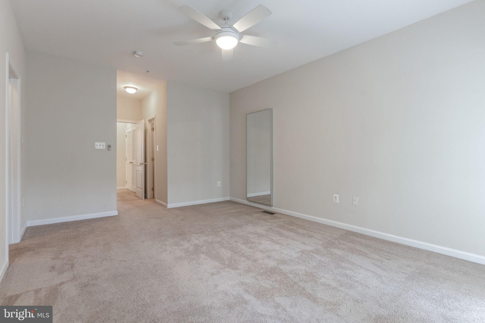 12404 B Liberty Bridge Road, Unit 12404B Fairfax, VA 22033 - Photo 36 of 43 a view of an empty room