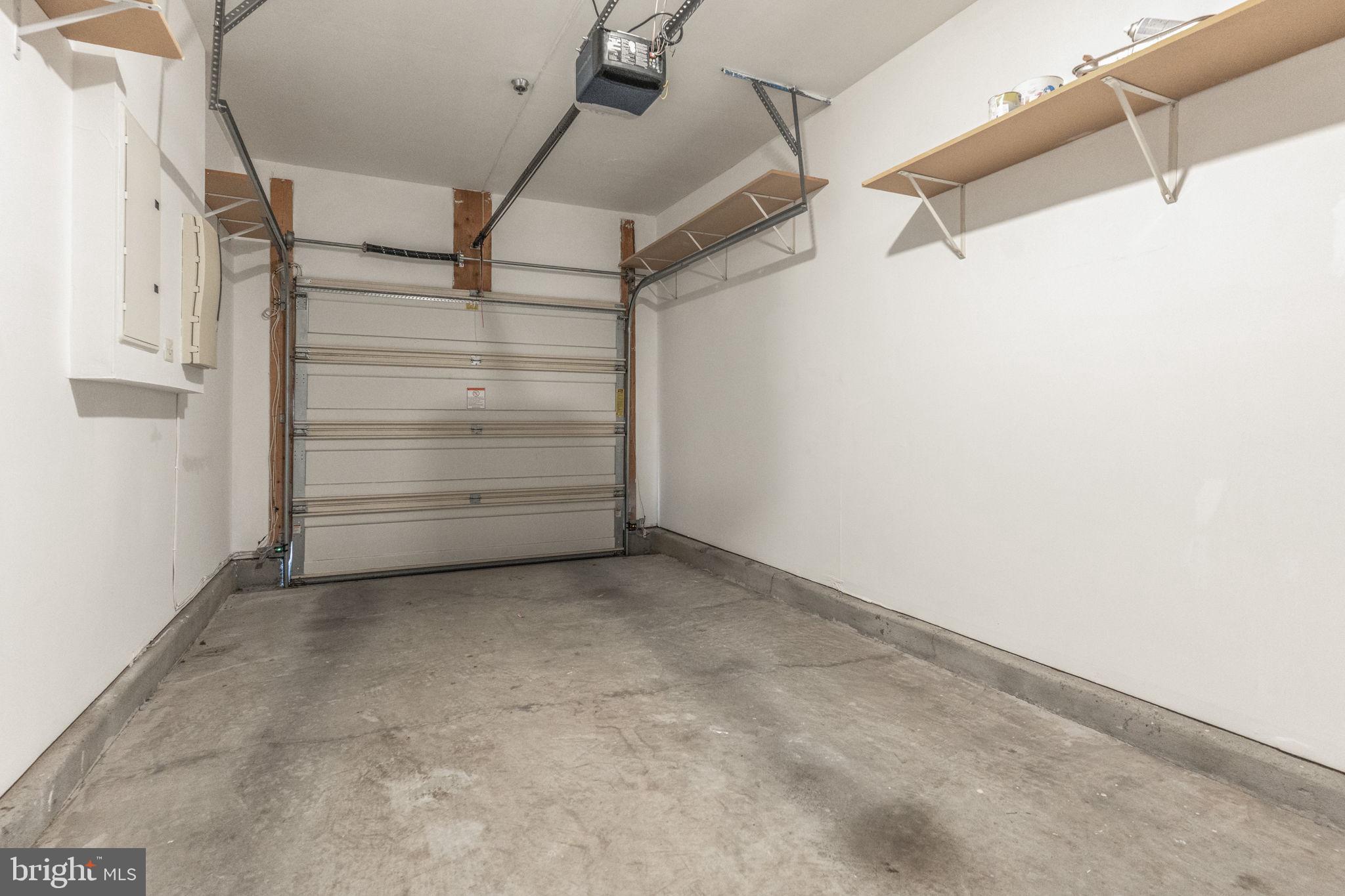 12404 B Liberty Bridge Road, Unit 12404B Fairfax, VA 22033 - Photo 43 of 43 a view of walk in closet with empty racks