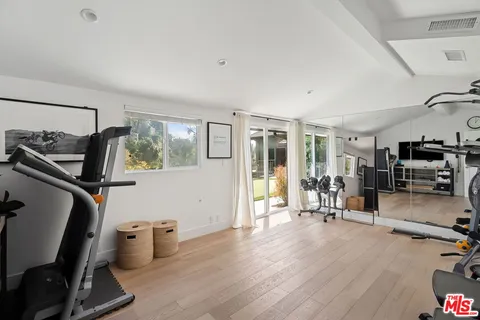 a view of a room with gym equipment