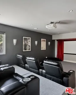 a living room with furniture a rug and a window