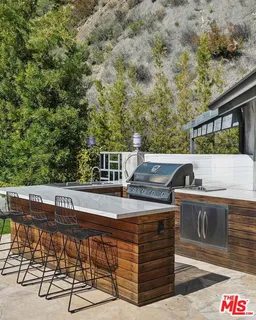 a view of balcony with furniture