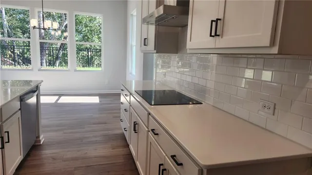 a bathroom with a bathtub and a sink